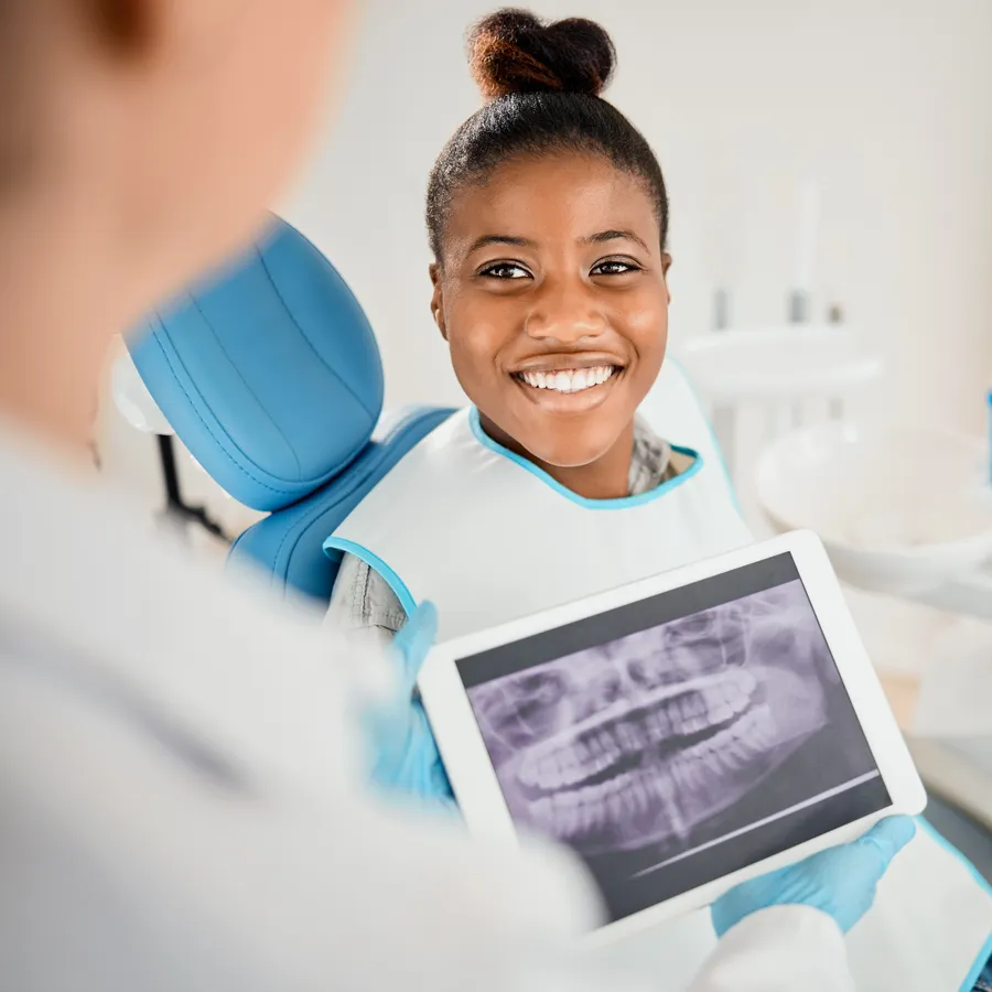 Patient reviewing dental x-rays during a consultation
